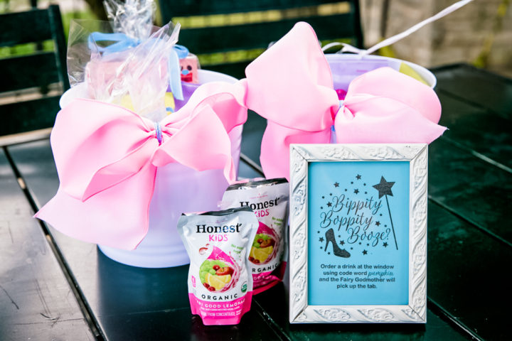 Snack pails with pink bows and juice boxes with framed printables