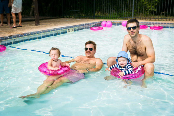 Babies floating in their personalized floats.